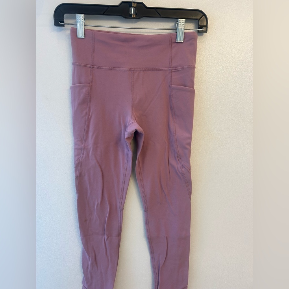 Athleta girl L/12 "high rise, stash your leggings"light purple